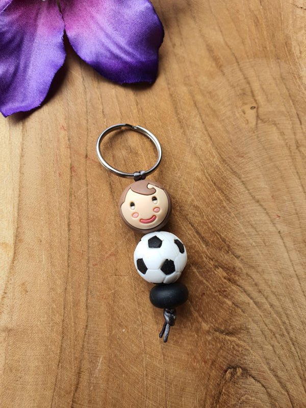 Sleutelhanger / tassenhanger Gelukspoppetje voetbaljongen