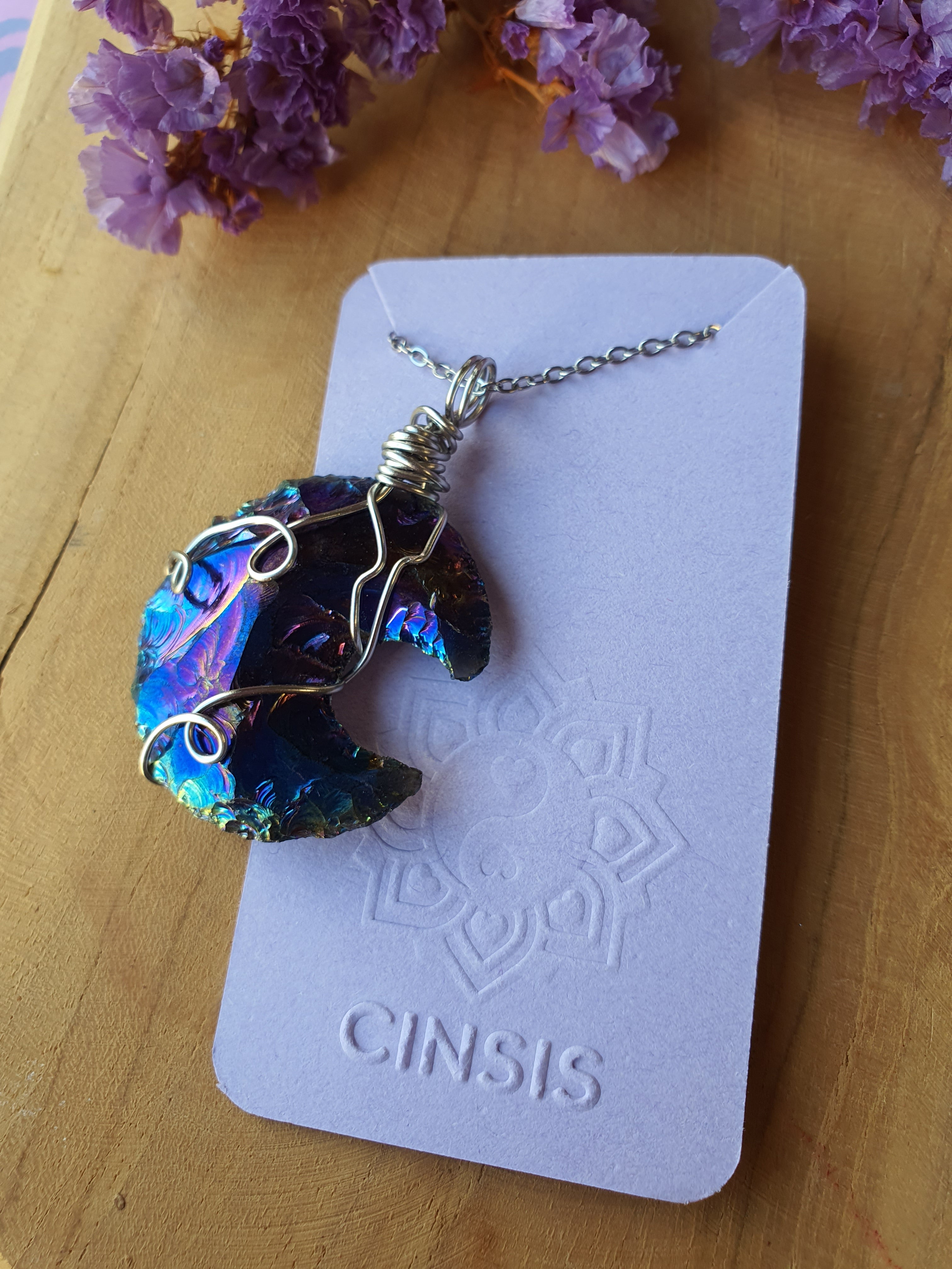 Wire wrapped Maan hanger Rainbow titanium hanger nr 16