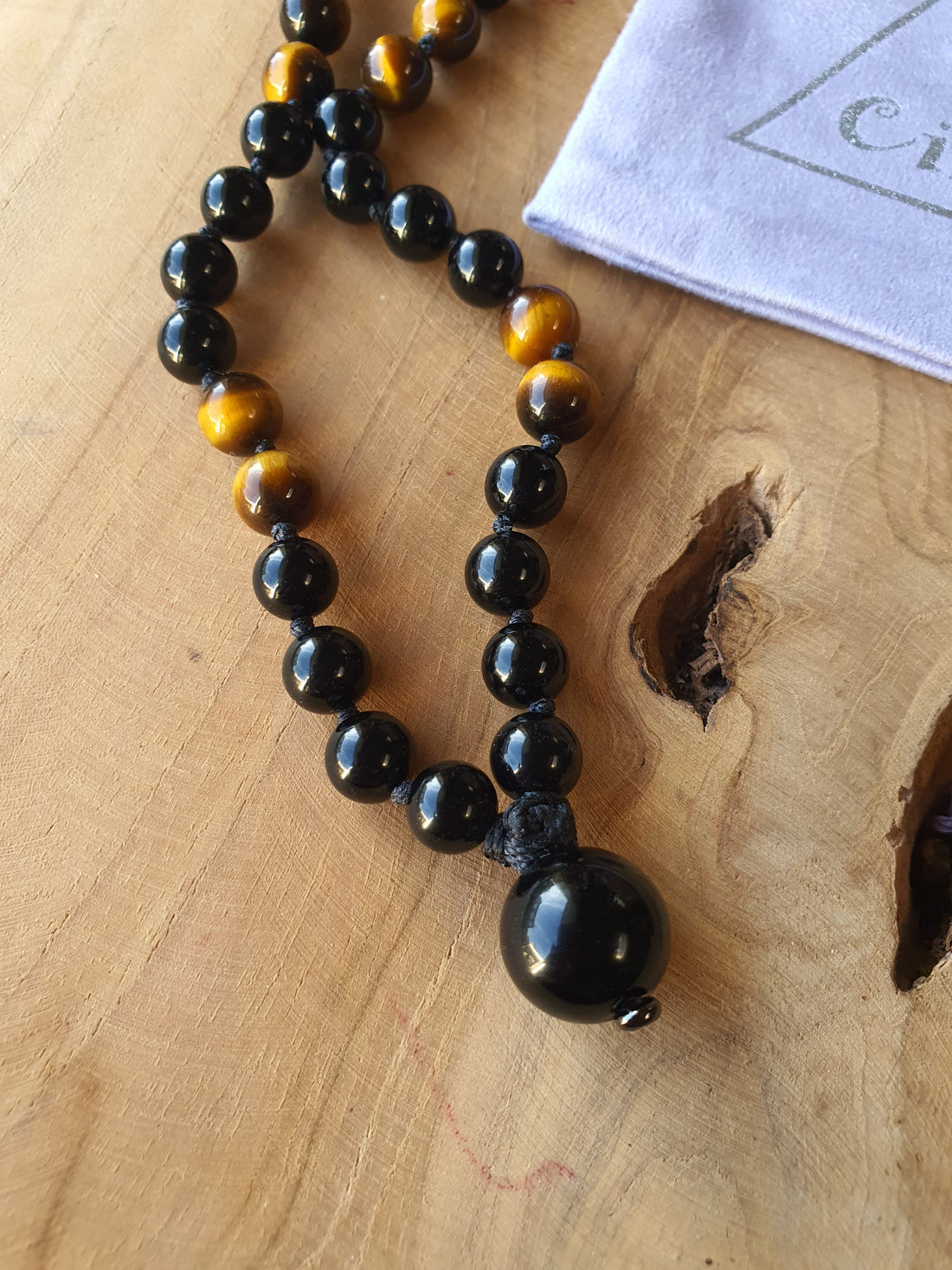 Edelstenen Mala Onyx met Tijgeroog
