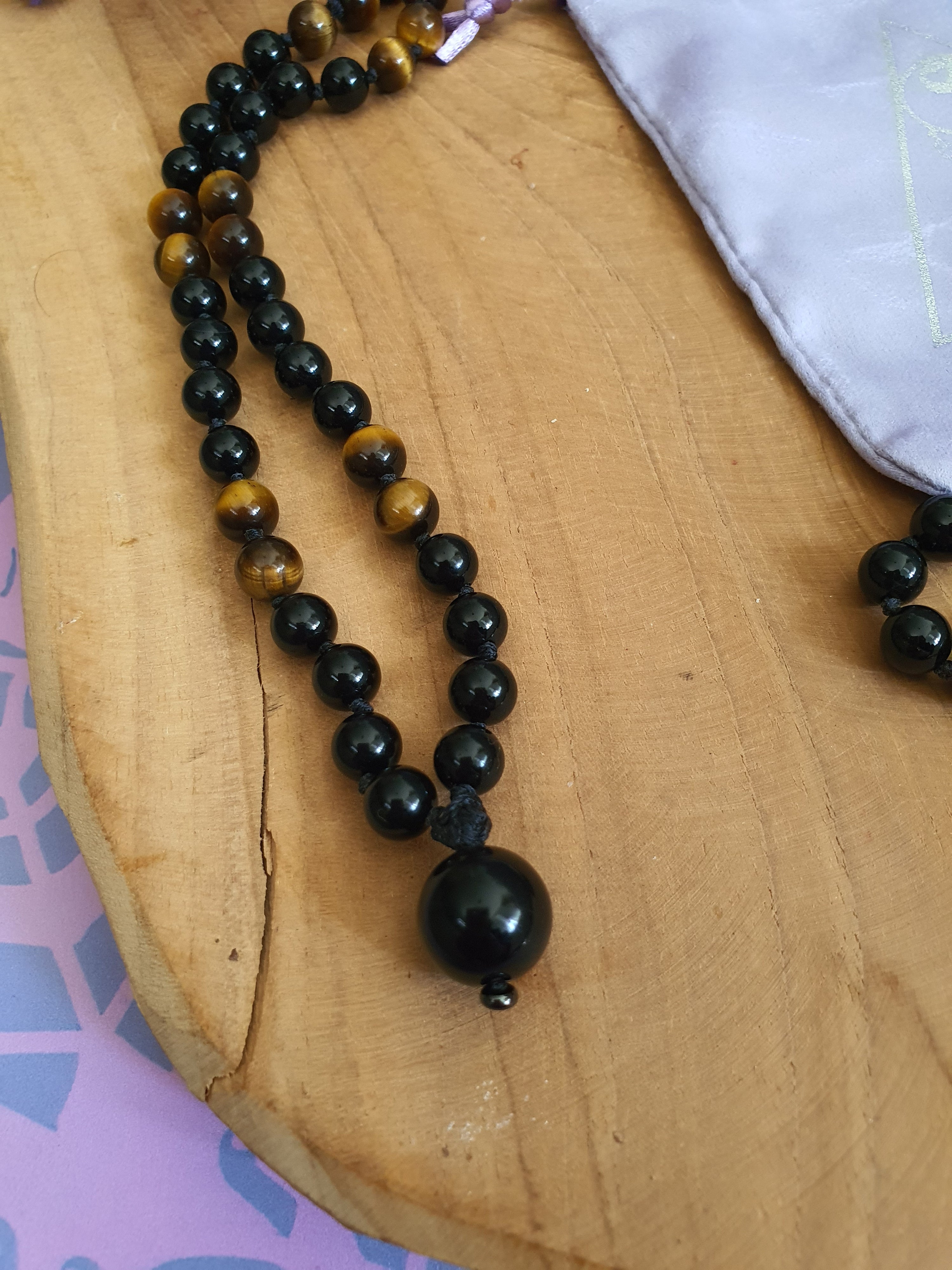 Edelstenen Mala Onyx met Tijgeroog