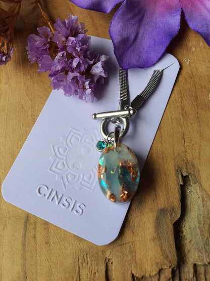 Orgonite Hanger Aquamarijn en Bergkristal met RVS ketting en zirkonia bedel (nr 1019)