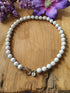 Basisketting Happy  rvs zilver / witte kralen