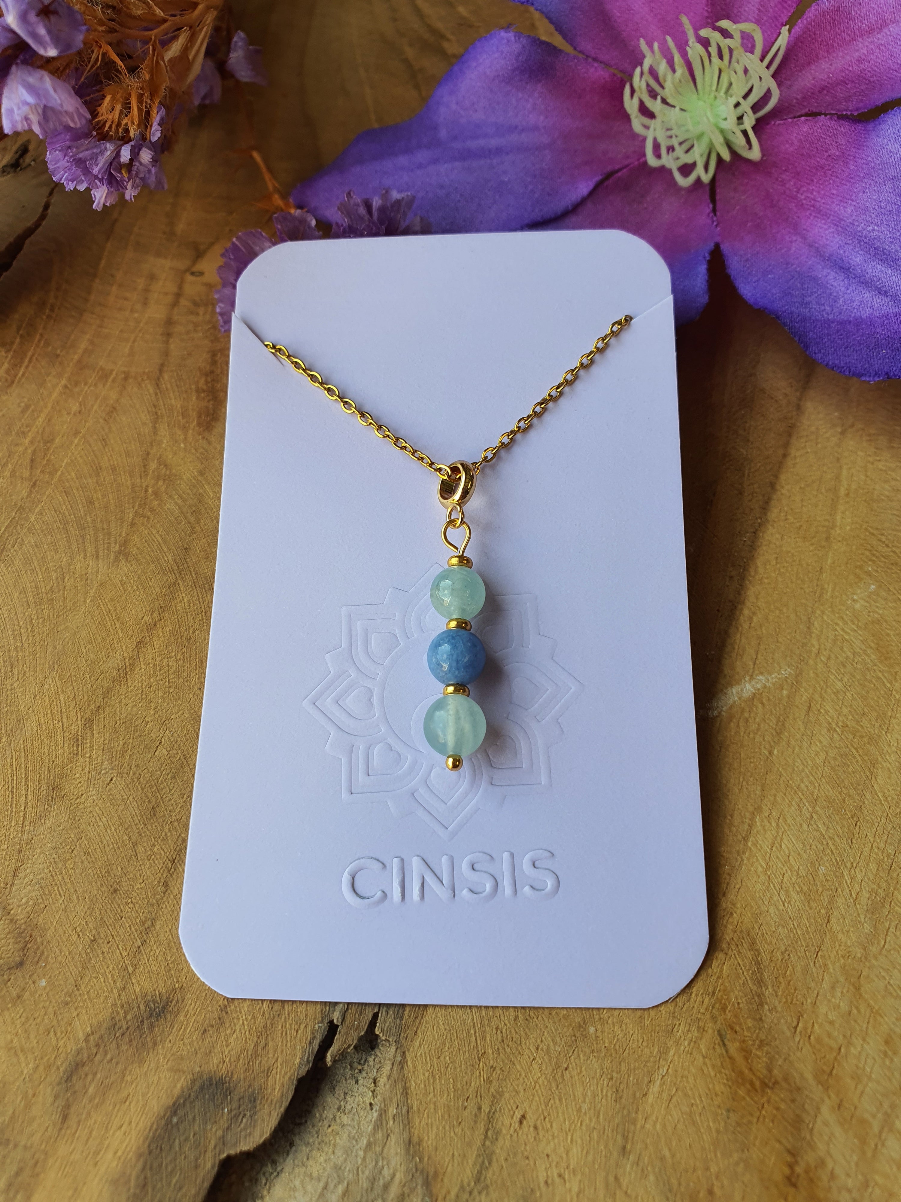 Edelsteen_Keelchakra_hanger_rvs_goud