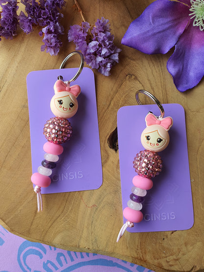 Sleutel- en tassenhanger Gouden Driehoek gelukspoppetje